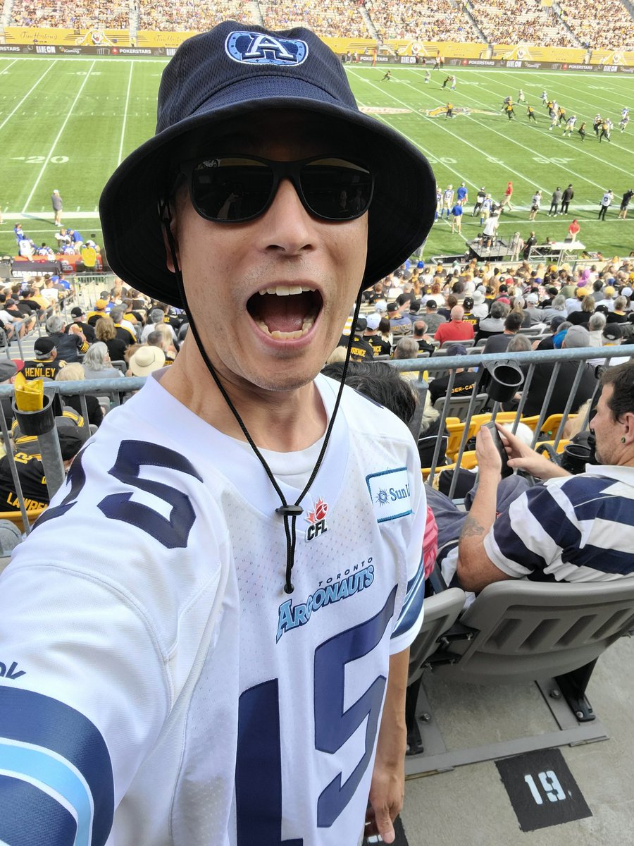 HPEWithYuAndMe's tweet photo. I'm sitting solo today, but might need @bluebomberwoman to keep me safe bcs I'm wearing @TorontoArgos #RickyRay jersey today! @Ticats fans must be in a kind mood for @CFHOF festivities today bcs I heard "awesome Ricky Ray jersey" before I heard "Argos suck!" 🤯 #CFLfamily https://t.co/dXnbFpGXLH