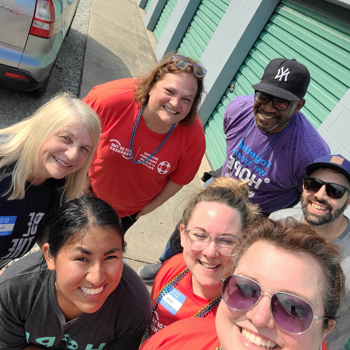 AFSPNebraska's tweet photo. Blame the sun for the look in our eyes, but we want to thank every. single. person! who came to the 18th annual #OutOfTheDarkness Walk for #AFSPNebraska 🥳🥳🥳💚💚💚💚 https://t.co/yY0vkH7IWJ