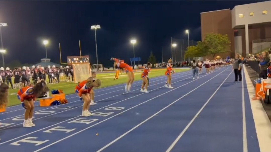 Our entire <a href="/DHS_cheer/">Danbury Cheer</a> team casually taking turns doing backflips during Friday nights game 🤷‍♂️ #TheHatterWay🤸‍♂️