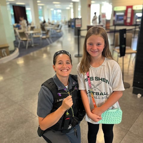 UAlbanyUPD's tweet photo. Officer Malecki received flowers today from this potential future #GreatDane at the annual @nyswritersinstitute book festival today in the @ualbany campus center. #UPDinthecommunity https://t.co/9Cj2KPE2sm