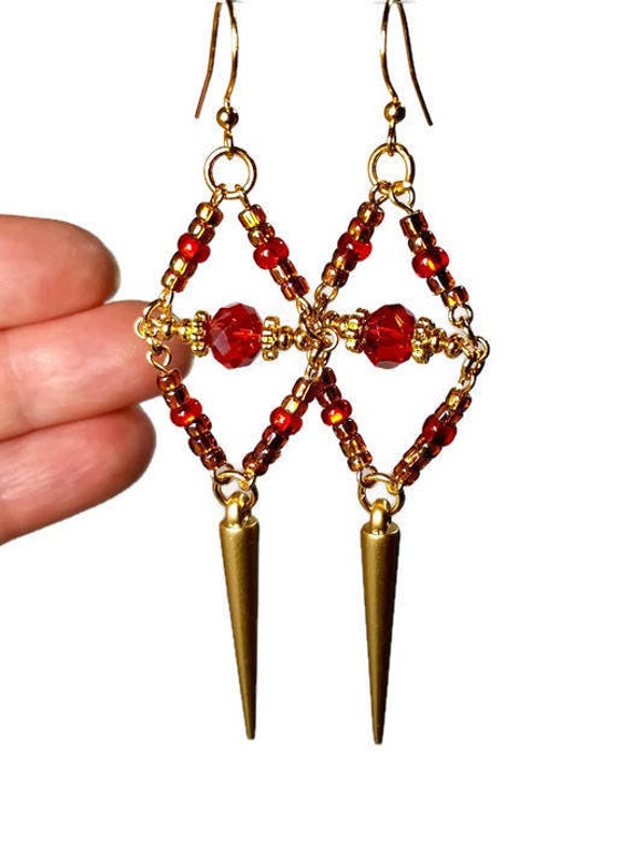 BluKatDesign's tweet photo. Red and Gold Spiked Earrings, Statement Earrings, https://t.co/Ux9Yrgibi5 #spikedearrings #beaddangleearrings #goldearrings #golddangle @etsymktgtool https://t.co/7uHr9pnA3i