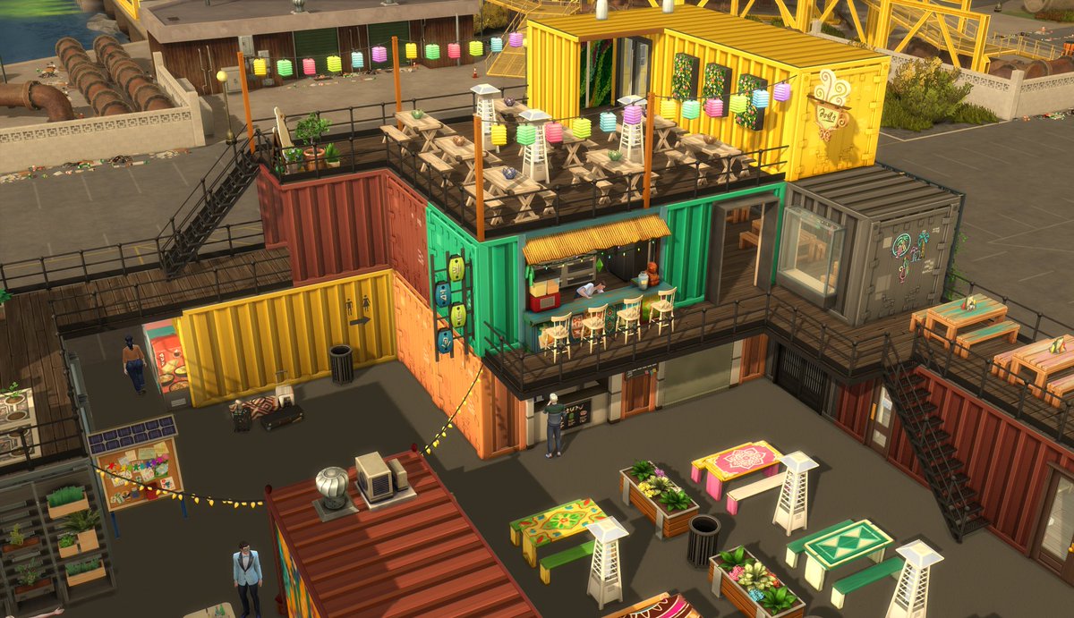 EmmaRoseTurner2's tweet photo. The Waterfront, a vibrant market place in Evergreen Harbour. Gallery ID is 6ert92 and make sure to have move objects on #TheSims4 #ShowUsYourBuilds https://t.co/bxDmGyw0d4