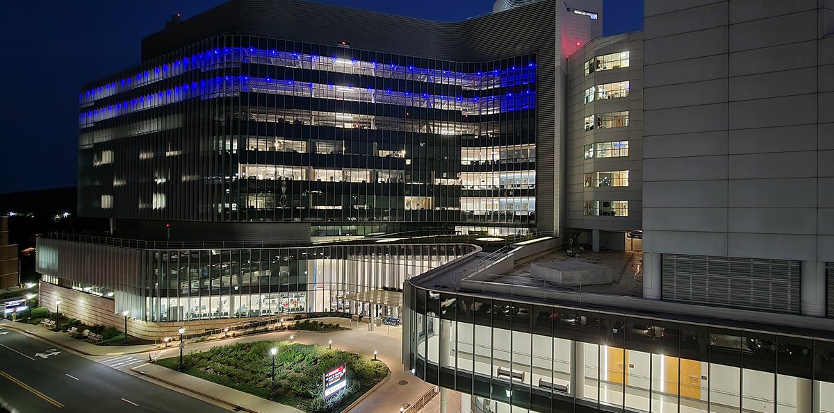 uvahealthnews's tweet photo. This weekend, the south tower of UVA Medical Center is illuminated in blue as we host our annual #PulmonaryFibrosis patient education conference. Pulmonary fibrosis, which causes lung scarring, is the number 1 reason why people need a lung transplant. @PFFORG #BlueUp4PF https://t.co/thueDOf0Mo