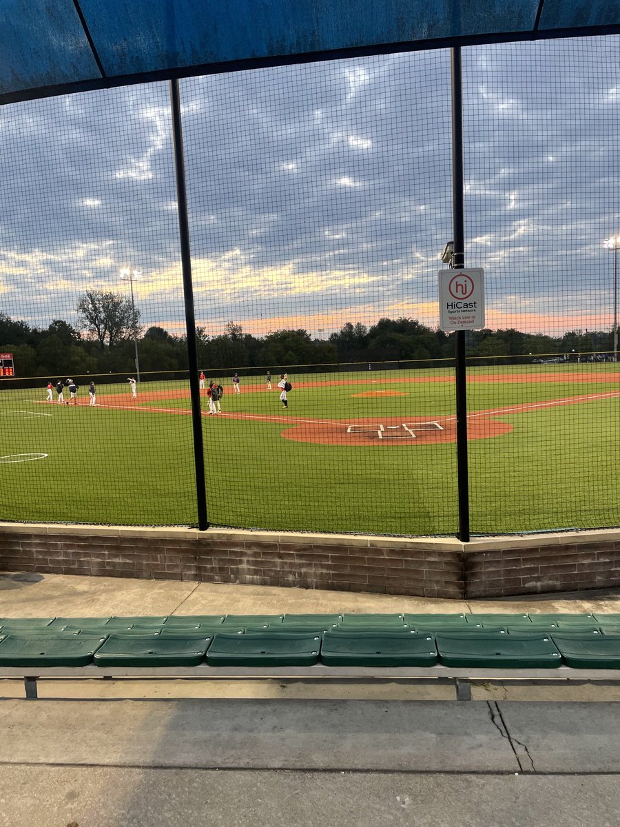 Taking the field bright and early . Travel ball life . Just how we do it !