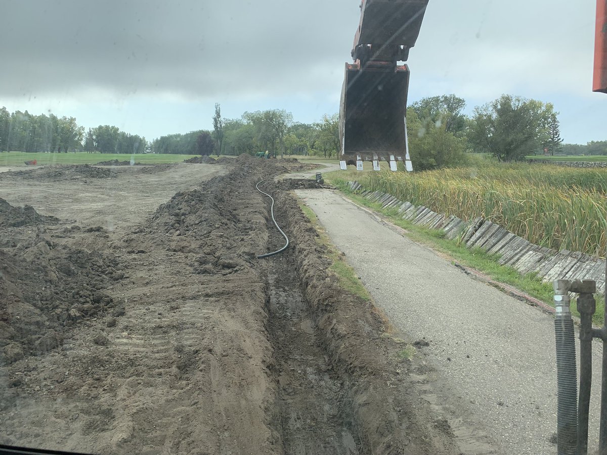 Pushing through Sunday - demo and topsoil removal on new fairway bunker on #14 <a href="/The_Wascana/">Wascana Country Club</a> followed by some irrigation excavation on #14 and #15 tees.