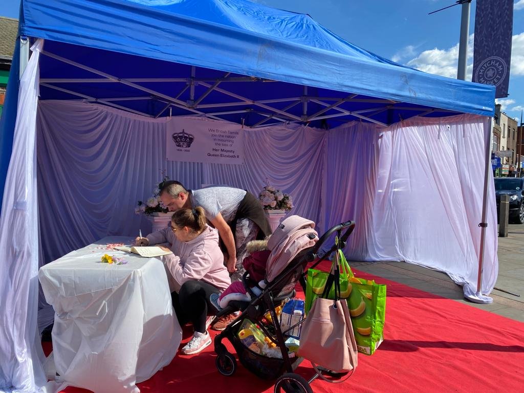 TamilGuardian's tweet photo. In South London, the Tamil Community Centre organised a tribute to the British monarch with a public tributes book, where members of the public could express their condolences. https://t.co/r1ZVZncQhG