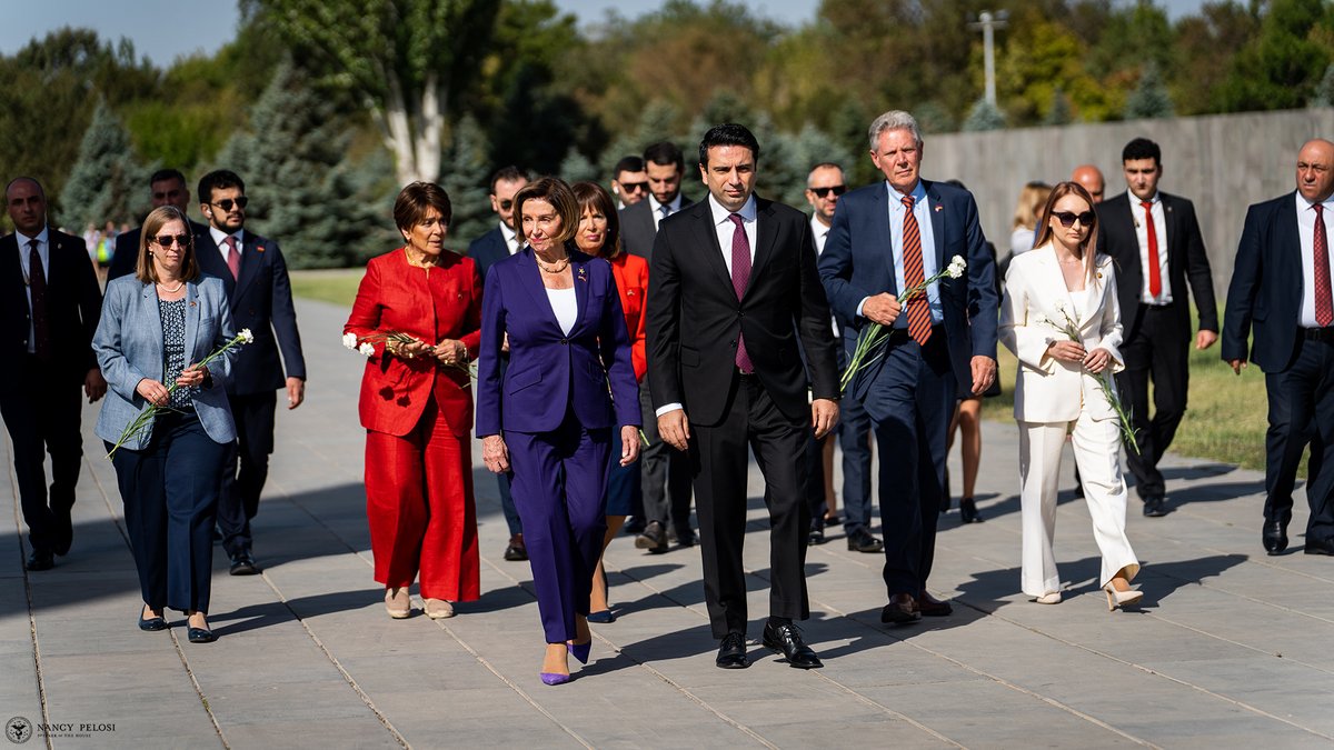 SpeakerPelosi's tweet photo. Today, our delegation was deeply honored to join @AlenSimonyan to lay a wreath at Tsitsernakaberd Armenian Genocide Memorial and pray for the 1.5 million Armenian men, women, and children murdered in the genocide. https://t.co/LlSVcS9faf