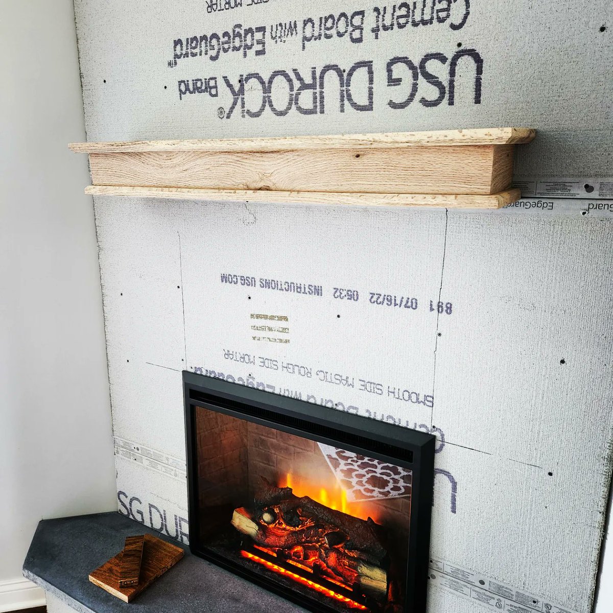The mantel is together and looks awesome up on the wall!🔥 Time to put some finish on it!! #woodworking #woodworks #mantel #fireplace #redoak #oak #diy #fireplacebuild #diydad