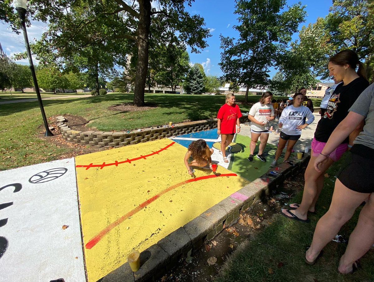 QUHawksSB's tweet photo. Scenes from the Homecoming tradition of Painting Penny Lane. #Team50 #HawkSB #splatter https://t.co/chvVXyAajB