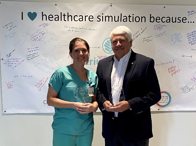 NCRockChalk's tweet photo. Carolinas Simulation Center finished off Healthcare Simulation Week on a high note by presenting our very first Simulation Awards. Congratulations to Dr. Michael Ruhlen-Simulation Champion of the Year and Dr. Melissa Woolworth-Simulationists of the Year! #hcsimweek22 https://t.co/92YJVqRXts