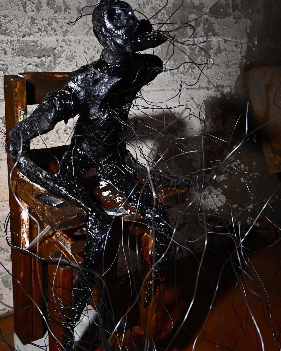 Maker/Member Jacques’ final sculpture for an apprenticeship over the summer at Sloss. Entitled “False Promises”, it was made mostly of cast iron, clay, steel wire and the chair was made by him as well.