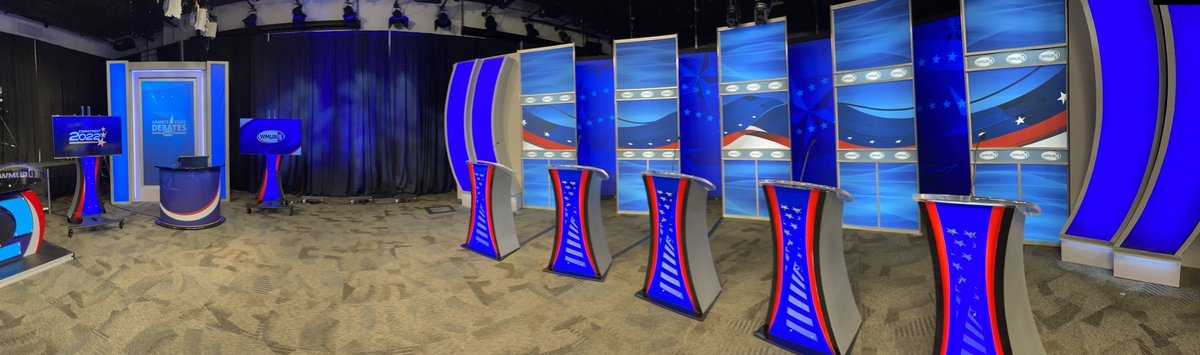 WMURSteve's tweet photo. GRANITE STATE DEBATES: The stage is set for tonight’s @WMUR9 first debate of the week. 
Up tonight: the Republican candidates in #NH01 

Live at 8 on air + streaming on the app

Special shout out to the @SaintAnselm students who helped our team get ready 

#wmur https://t.co/sjy0wHcKfg