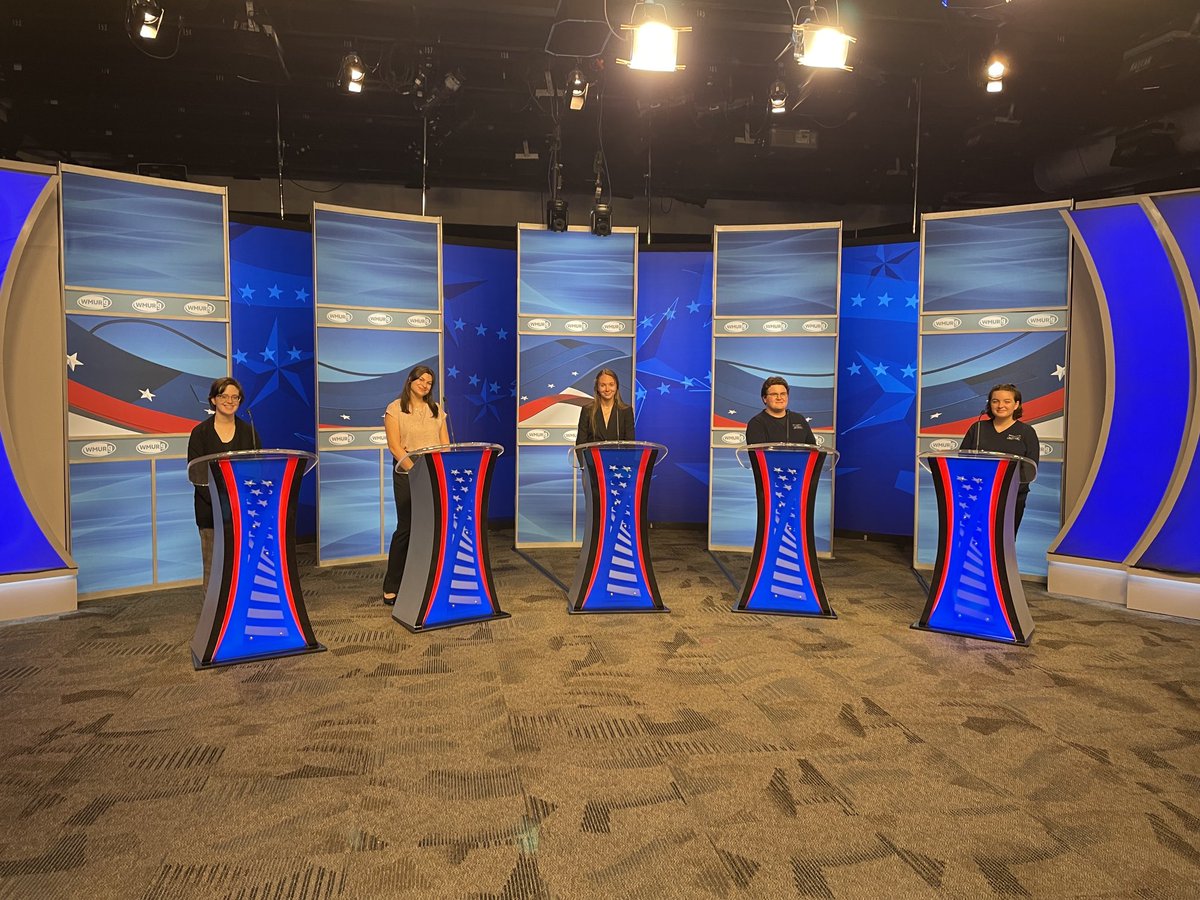WMURSteve's tweet photo. GRANITE STATE DEBATES: The stage is set for tonight’s @WMUR9 first debate of the week. 
Up tonight: the Republican candidates in #NH01 

Live at 8 on air + streaming on the app

Special shout out to the @SaintAnselm students who helped our team get ready 

#wmur https://t.co/sjy0wHcKfg