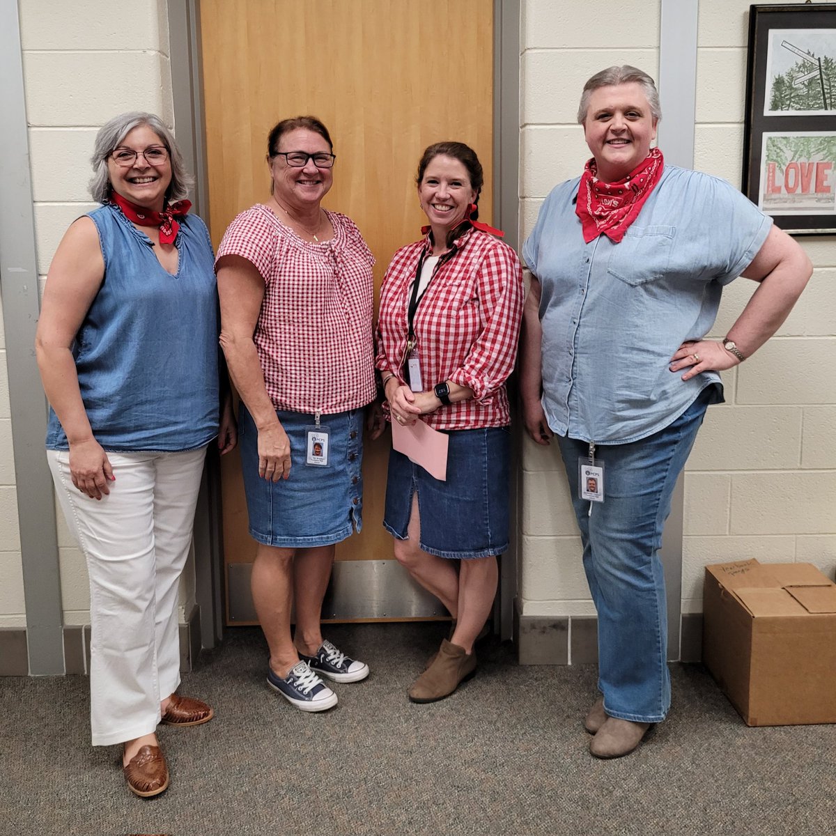 KathMTBC's tweet photo. Blue jeans, bandanas &amp; pony tail braids - oh my! @PowhatanHS office Staff were feeling the school spirit for Western Day today. Looking forward to our first home game this Friday!! 🖤🧡 https://t.co/ZlctnKEq8I