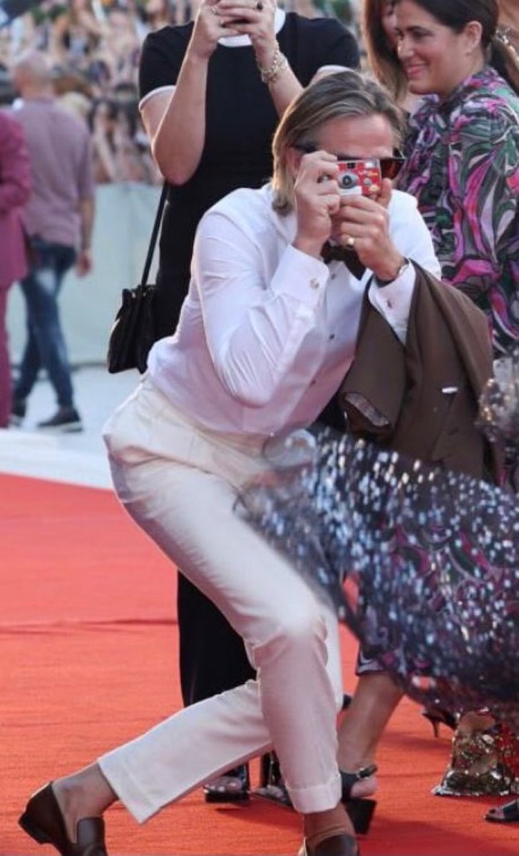 Taking photos for tourists like