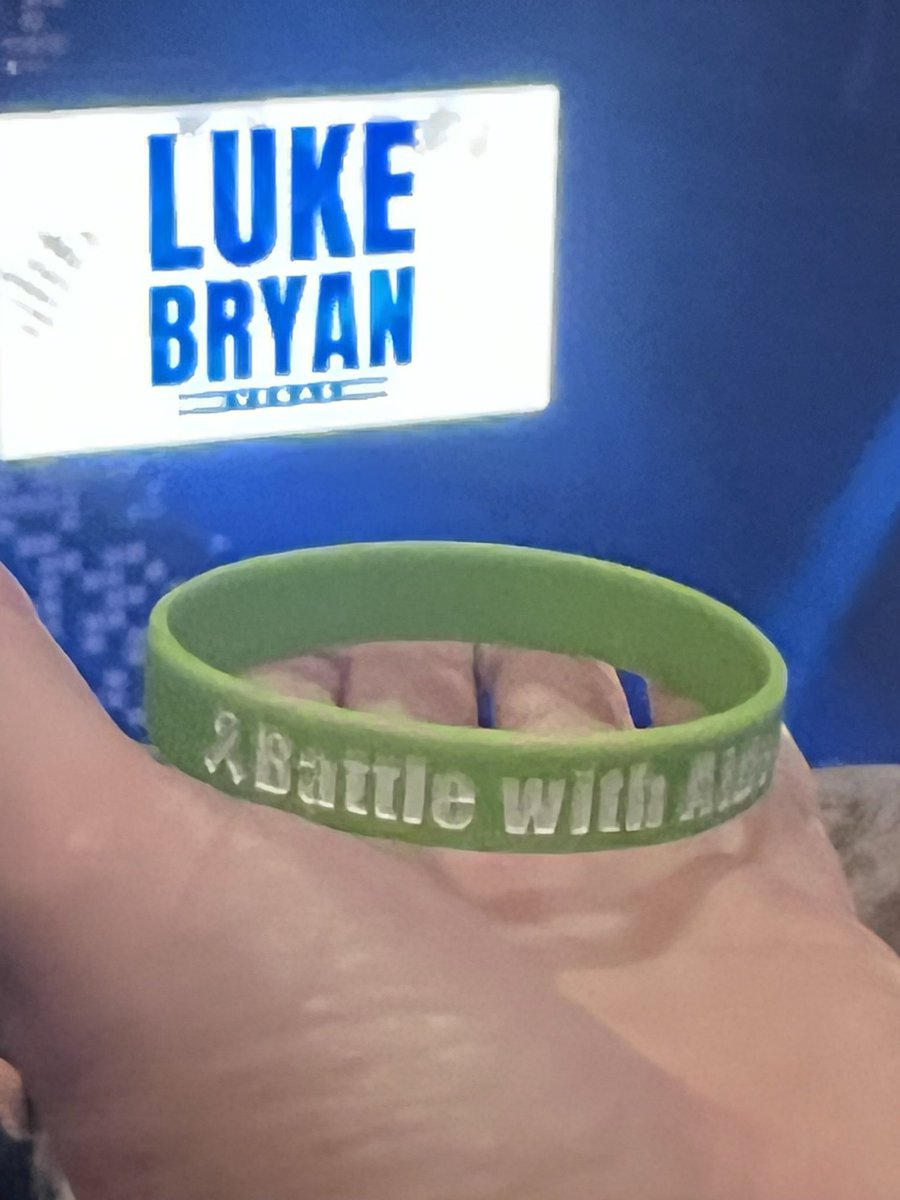 Greensr03's tweet photo. We were able to see Luke Bryan in Vegas this weekend. What an amazing show. Thought we would rep Aiden while there. He would have loved it. Sure miss our boy! 💚💙#lukebryan #teamalg #aiden80563 https://t.co/ldJ8QQP6bn