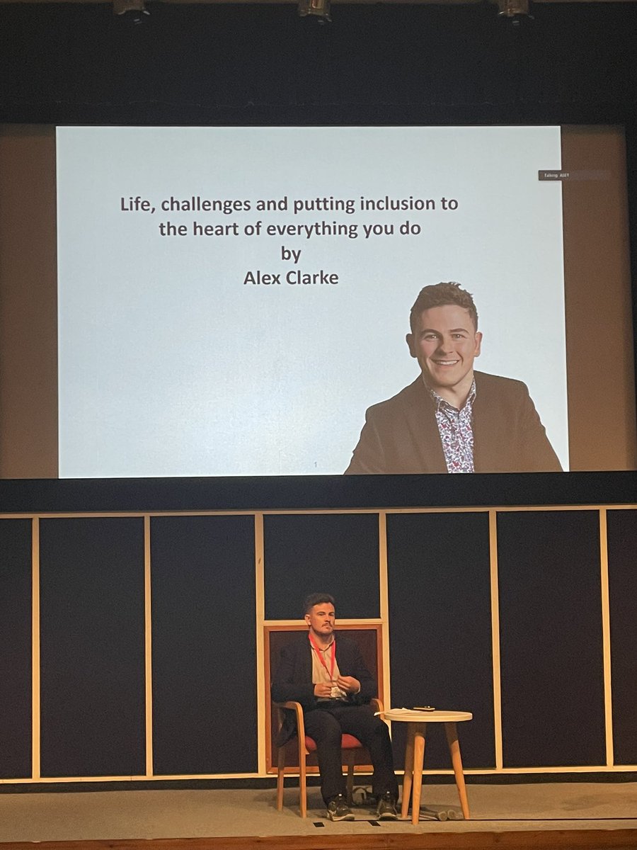 Alex starts his talk with asking the audience to consider the difficult questions for the Q&amp;A. #ASET22