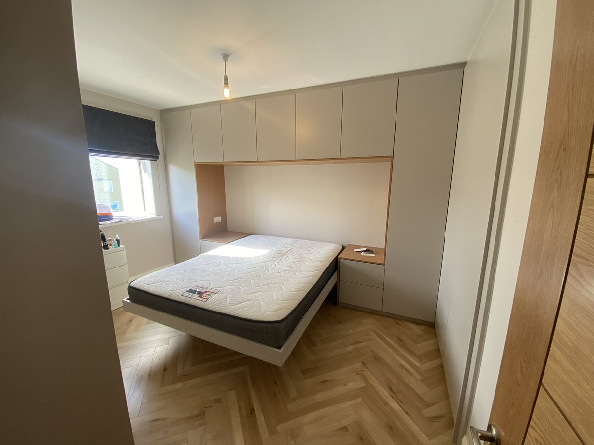 Fitted wardrobes with over bed storage. #tegre #furniture #Sligo