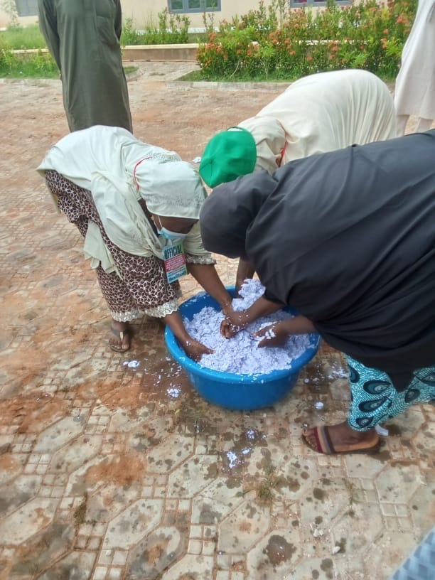 RuwesIntiative's tweet photo. Participants in the briquette production process using paper materials. https://t.co/u1EqnYBxQe