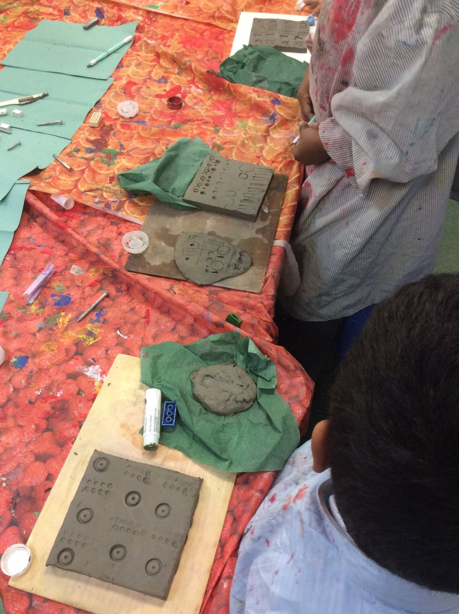 MrsBridgeEPS's tweet photo. We have been creating our own clay tiles in Art today, they look wonderful #WeAreBrightFutures https://t.co/RPHzMRZnm4