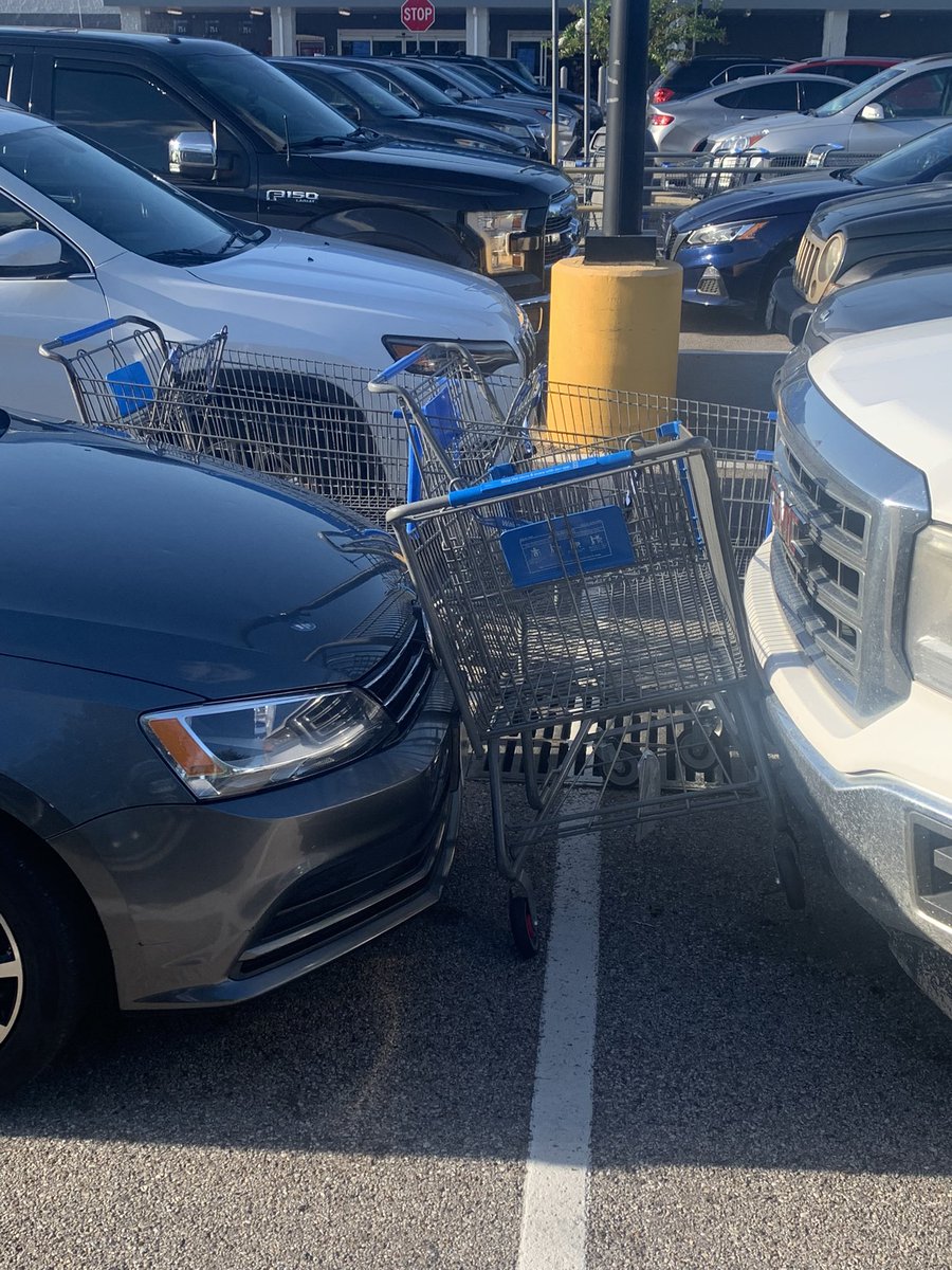 JoshThiel's tweet photo. We need @CartNarcs Special Agent Sebastian on the scene for this cart quandary at the local Walmart Neighborhood Market. #returnyourcarts #lazybones #itsnotthatdifficult https://t.co/UIWGrFXqa2