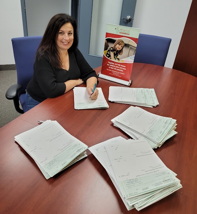 Thank you to Dr. Susan Murray, Chair, Board of Directors who helped prepare our Back to School cheques that will fund our KES Clubs. Thank you to everyone who supports our program.  #EveryBreakfastCounts #EveryChildCounts #EveryDollarCounts