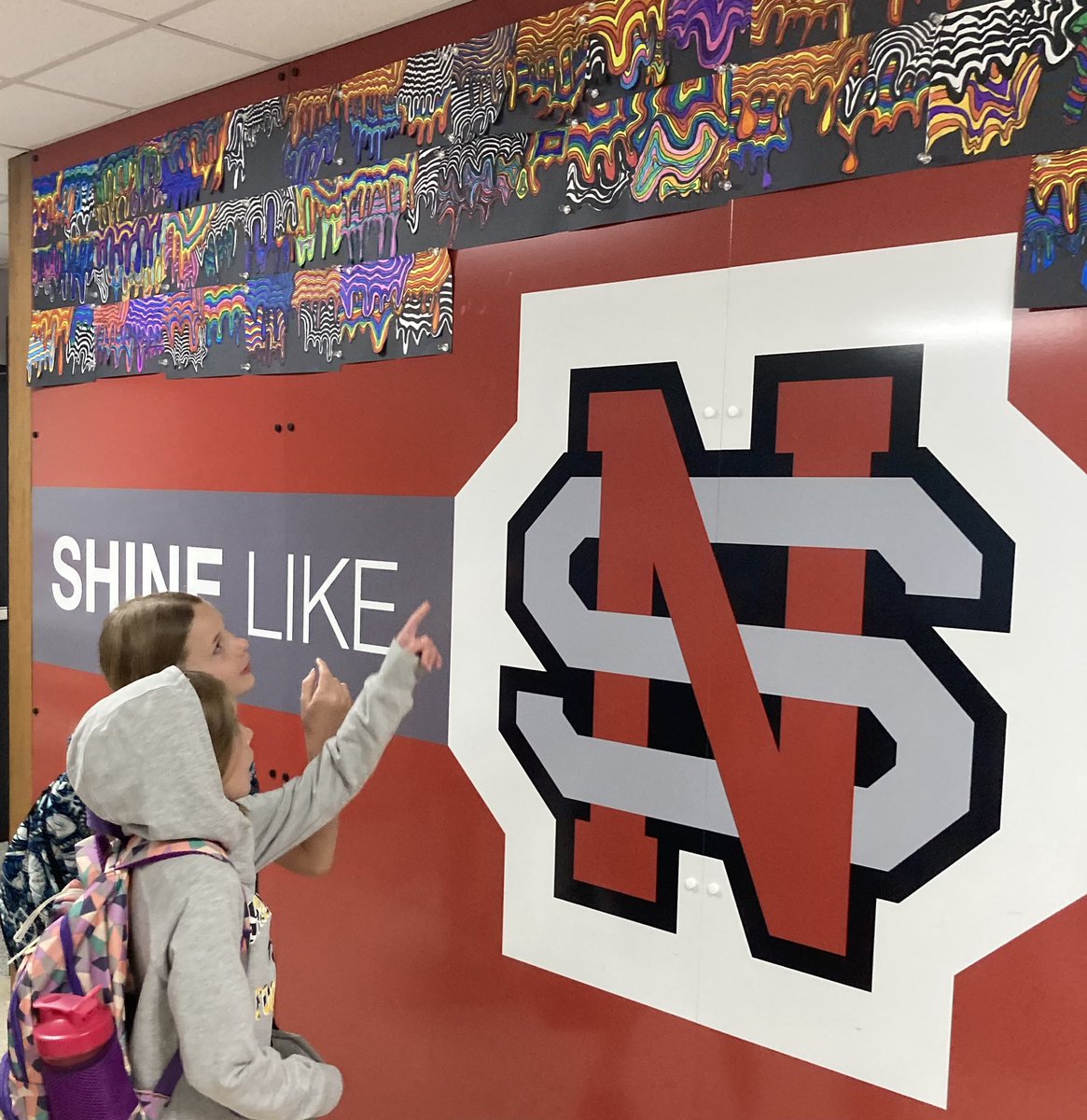 ASCounselor's tweet photo. Students came in this morning and saw their art work displayed!  I love to see how excited they get!!  It’s amazing to watch all kids stop and appreciate the beauty.  Way to go, Mrs. Graham 😁🎨
@MrsGsNSartclass 
@NorthScottASES https://t.co/MCXrxtY7xM