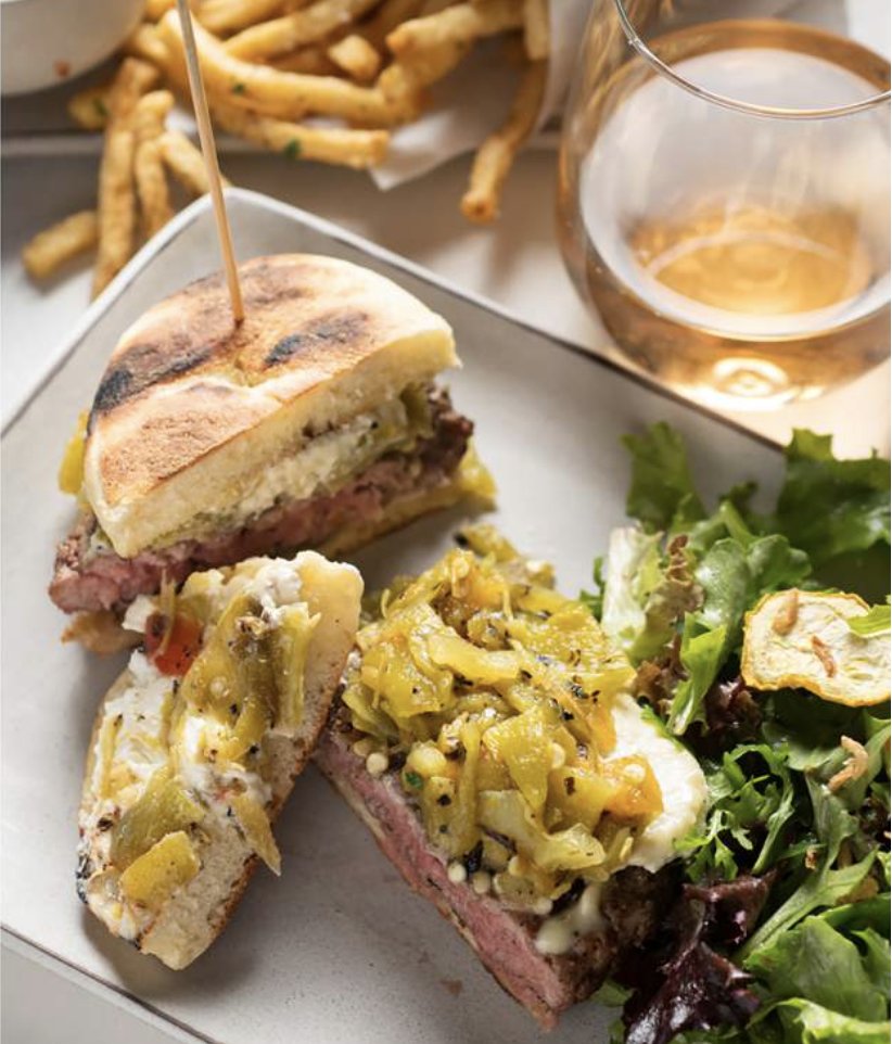 NMMagazine's tweet photo. Chef Joseph Wrede proves there’s more to burgers than beef with his Santa Fe pub’s extra-full-flavor NM Lamb Burger with Green Chile & Sheep Cheese. “We’re in lamb country in New Mexico,” says Wrede. #GCCB https://t.co/hiUMKY1Q4F https://t.co/8pvQc0T67y