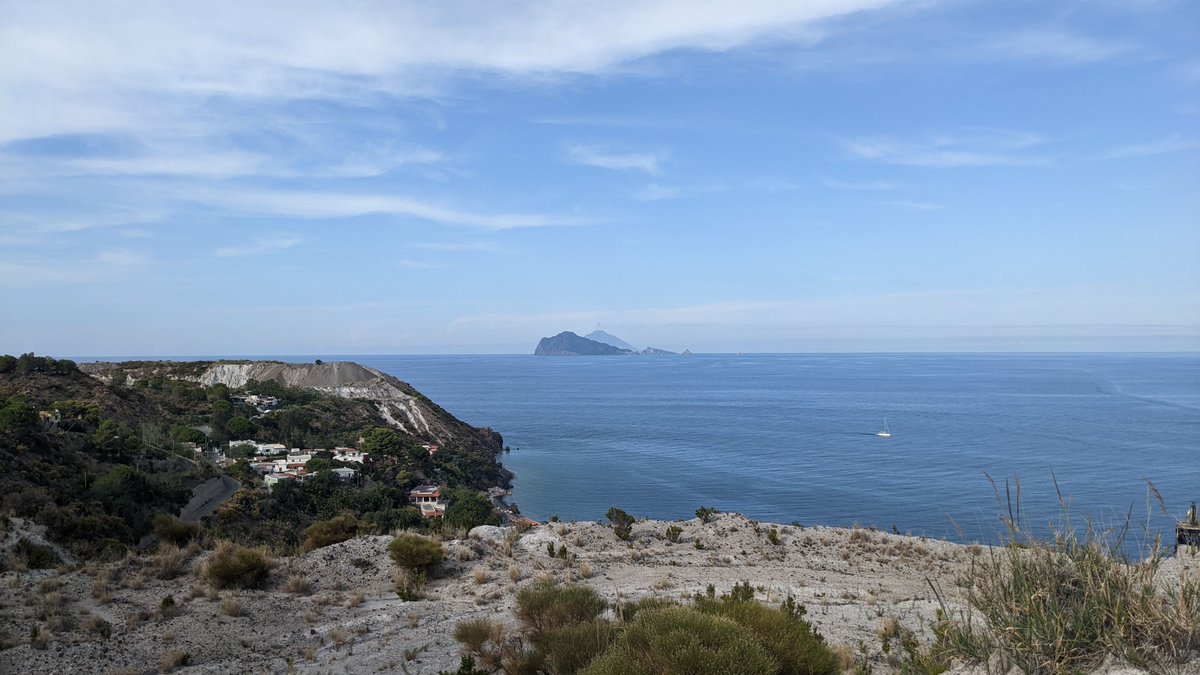 bsburnham's tweet photo. Hung out on the Aeolian Islands last week looking at volcaniclastics with @Liam_Geochem & @john_arcade - the rocks and views did not disappoint. Saw some awesome #seddy structures and even caught a glimpse of #stromboli activity in the distance! 🌋 Much to do with these rocks. https://t.co/bRhBmqMDsl