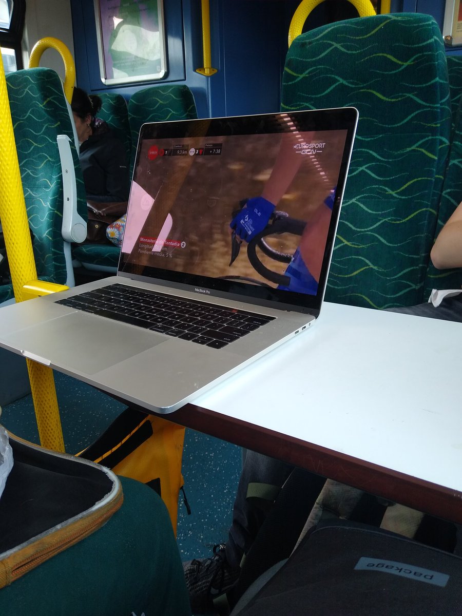 How long before the stranger next to me notices I'm watching La Vuelta with him