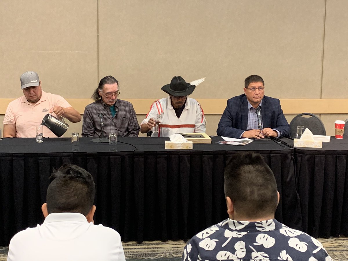 BreezyBreMc's tweet photo. Mark Arcand (far right) asks us not to use his STC title, saying “This is about my family.”
We are at TCU place to honour two of the victims of the James Smith Cree Nation massacre. 
His sister, 48 year old Bonnie Burns, and nephew, 28 year old Gregory Burns, were killed. https://t.co/cunczTGLQa