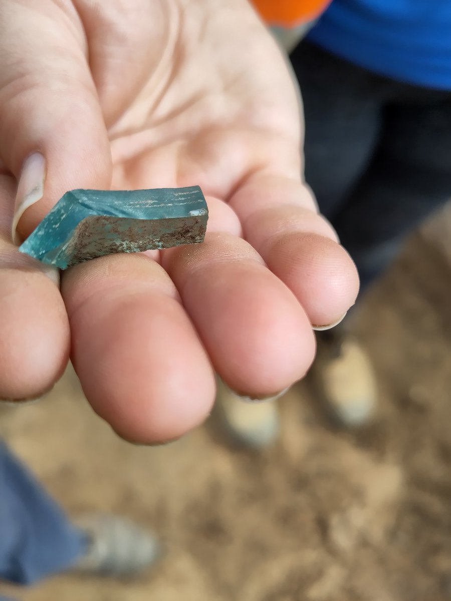 ExploreThePast's tweet photo. #RootsInTime dig diary day 9: The rain held off and lovely finds returned in force, with a fragment of Roman glass, several coins, a repaired pot, handled pot and another piece of roof tile! (1/3) https://t.co/HNsvwxQsQu