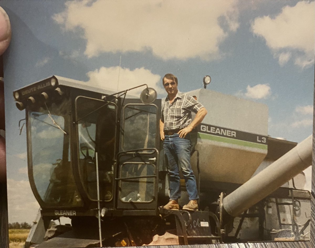 My dad in the 1980’s.  2 of these units with 24 foot headers. Electric over hydraulic, centre cab design, engine in back, 100 gal of fuel a day each. 160 acres a day was the goal. Life was good.