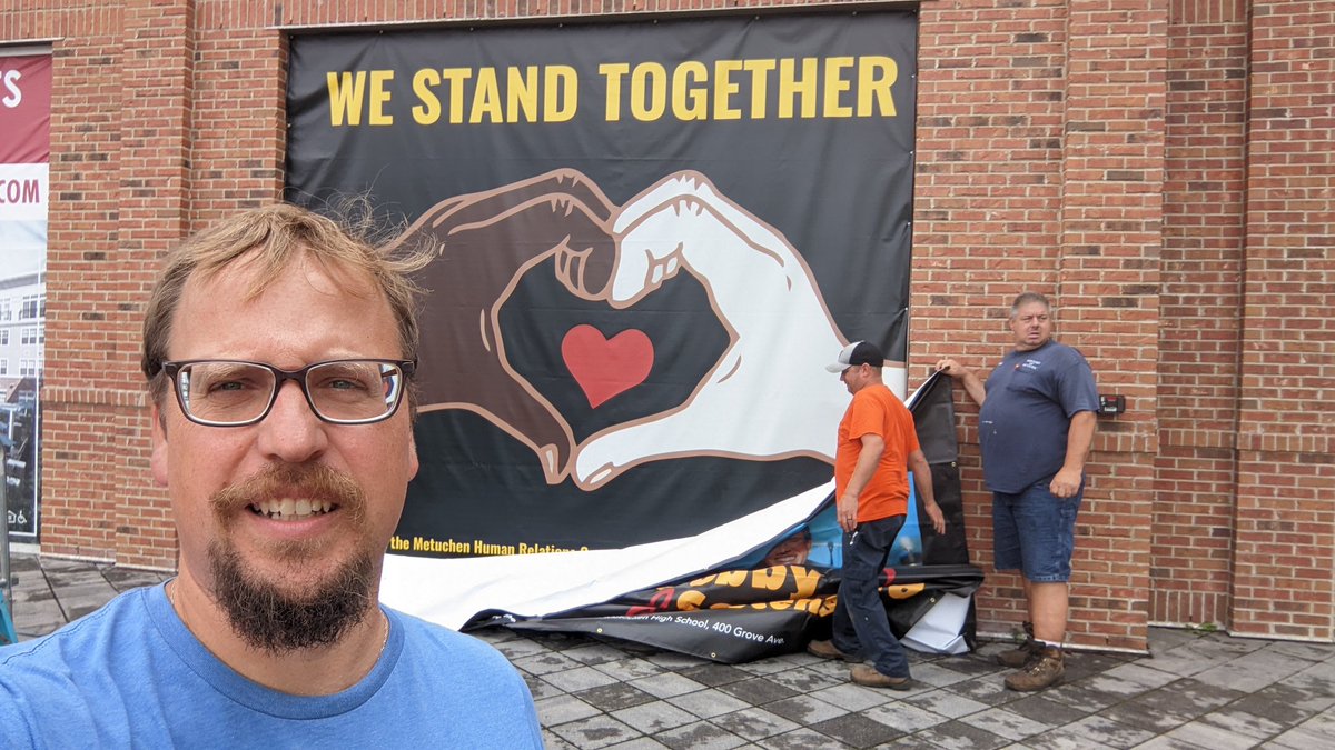 Caught our selfie banner for one last picture before it goes down. In Metuchen #westandtogether. Hat tip to DPW for their hard work making our downtown the best it can be.