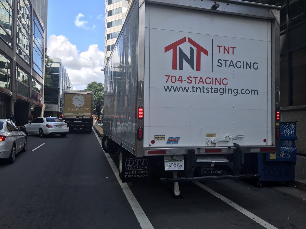 bikeMSSNGR's tweet photo. TNT Staging. Charlotte, NC 
The driver said that the client is high profile and more important then my usage of the bike lane. 
He even demonstrated that the plastic bollards were bendable which makes it so they can park. 🤦 https://t.co/l74h0UrzZP