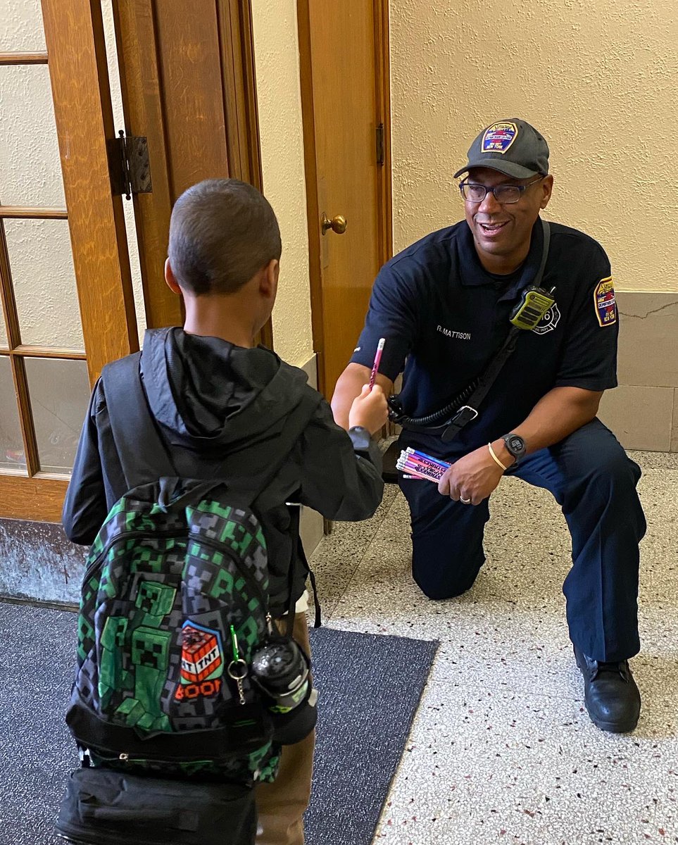 syracuseFD's tweet photo. Happy first day of school! As students arrived back from summer break, #syracusefire continued our tradition of passing out SFD pencils to students at every school in the City. Every FF working, incl. the Chief, went to a school to do this and wish ‘good luck’ with the year. https://t.co/eSShNVv30E