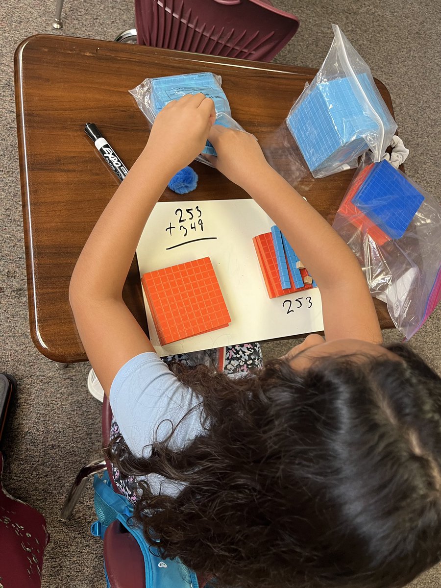 FamMarty's tweet photo. @TravisTornados1 @ECISDmath @ECISD_T2L  #4thgraders using base ten blocks to learn why we regroup! https://t.co/qHZotJ4Nav