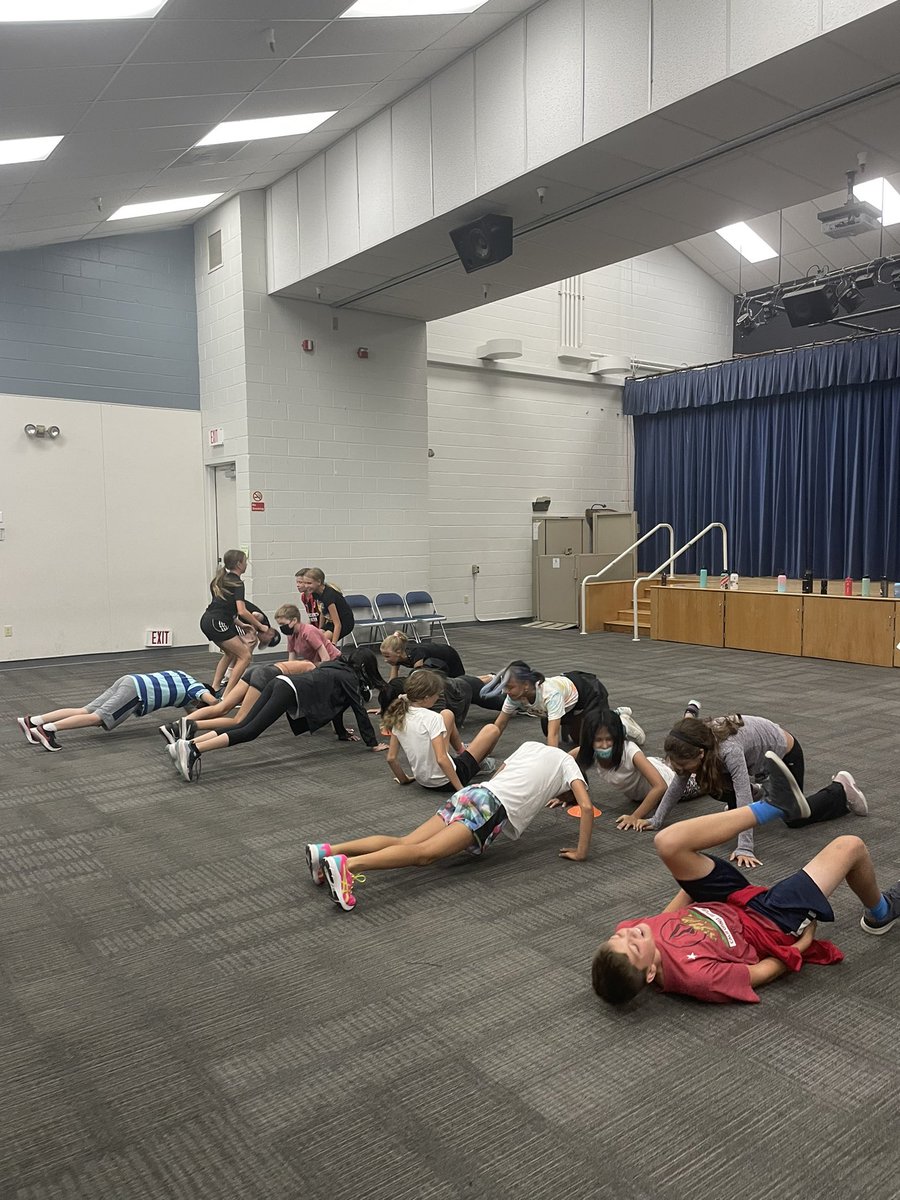 CoachSaraLang's tweet photo. “Meet Me in the Middle” partner #physedactivity for our #sixthgrade students. Ss start against the wall, then run to the middle to complete the exercise with their partner. The Ss have to remember the sequence of exercises and complete them in order. #indoorphysed #indooractivity https://t.co/CJab3yaMoU