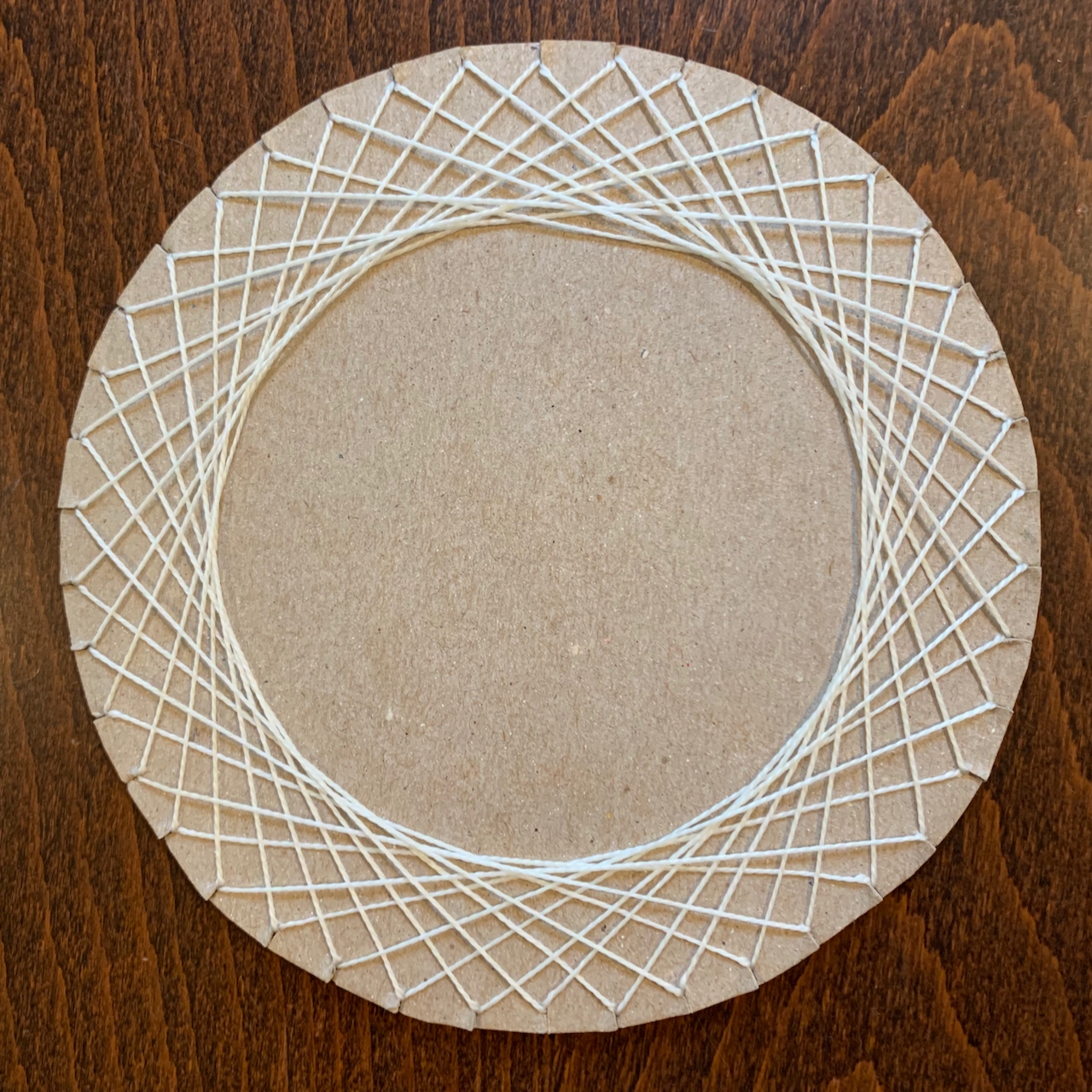Dave Richeson on X: String art made with the cardboard backs of paper  tablets: a cardioid, two 42-gon stars, and a double parabola.   / X