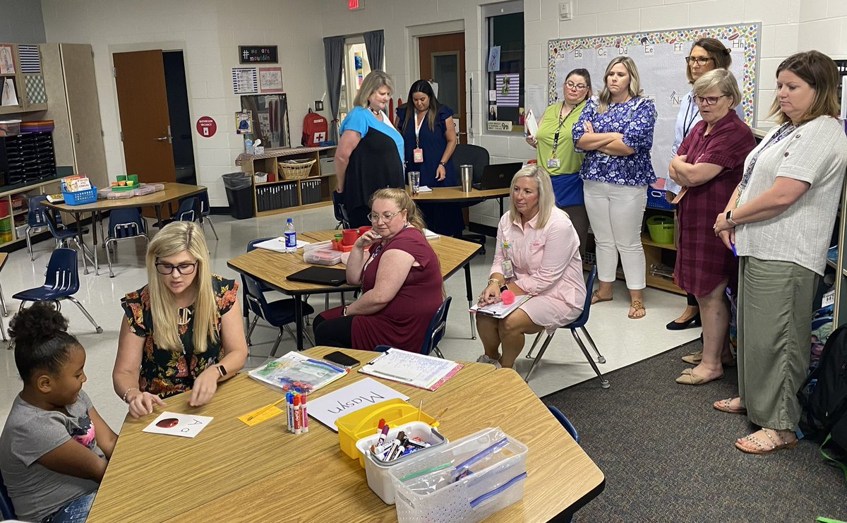Kindergarten teachers &amp; assistants <a href="/mauldineagles/">Mauldin Elementary</a> participated in a pd to learn about name &amp; letter work. Pre-A small groups are led by the teacher and/or the assistant &amp; are based on data. Here they are watching a student trace the letters in her name in the ABC book