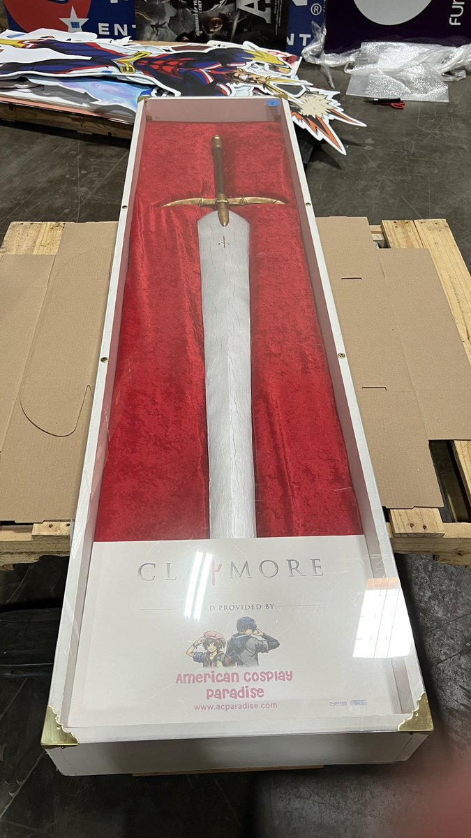 neumaverick's tweet photo. It’s been a wild trip down memory lane when cleaning out some old FUNimation convention stuff that was merged in with our Crunchyroll events storage. The first pop up wall we ever used, DVD table stands for our booth store, a booth graphic for Hetalia, Claymore sword. Just wild! https://t.co/oJxlPnj0oJ