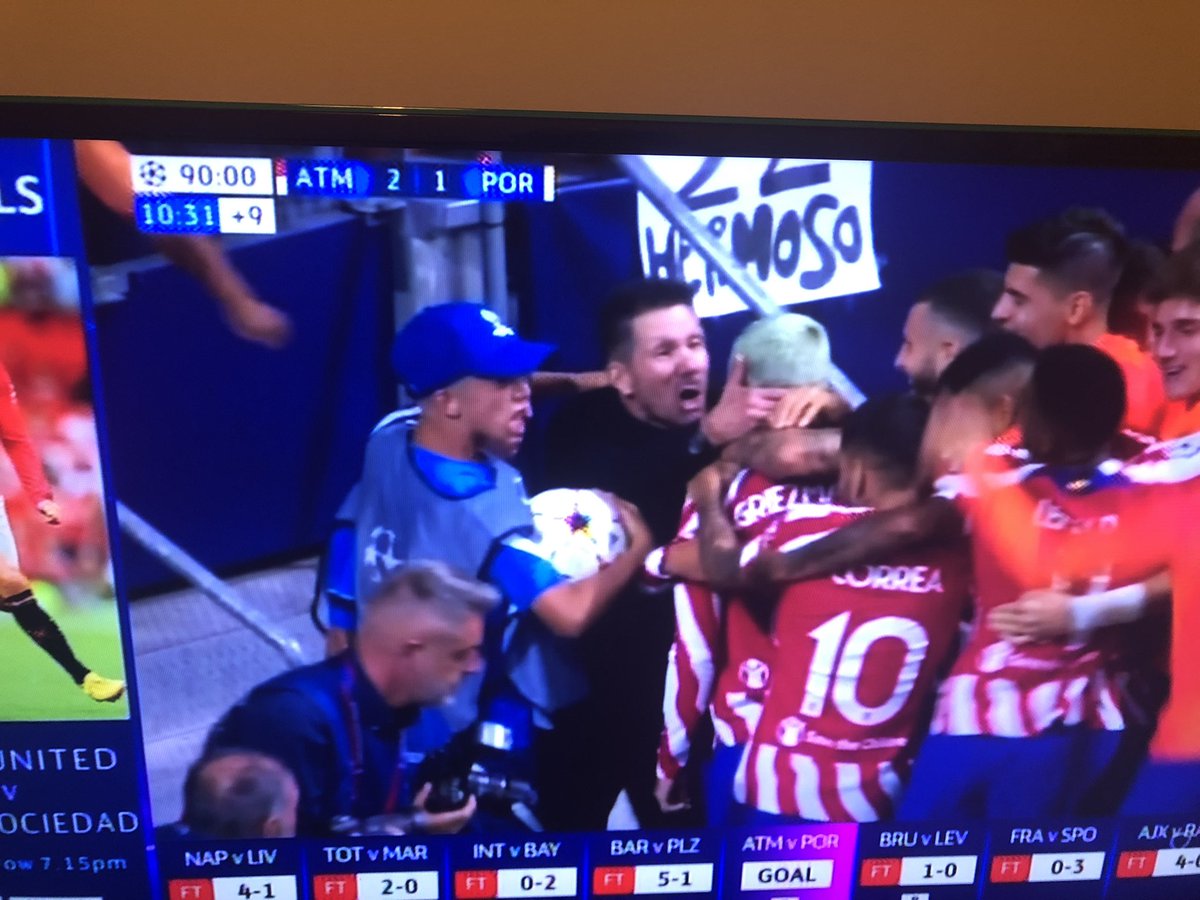 scot_munroe's tweet photo. Diego Simeone celebrating with his players after Griezmann winner #ATMFCP #ATMPOR https://t.co/zs8IA3HWy9
