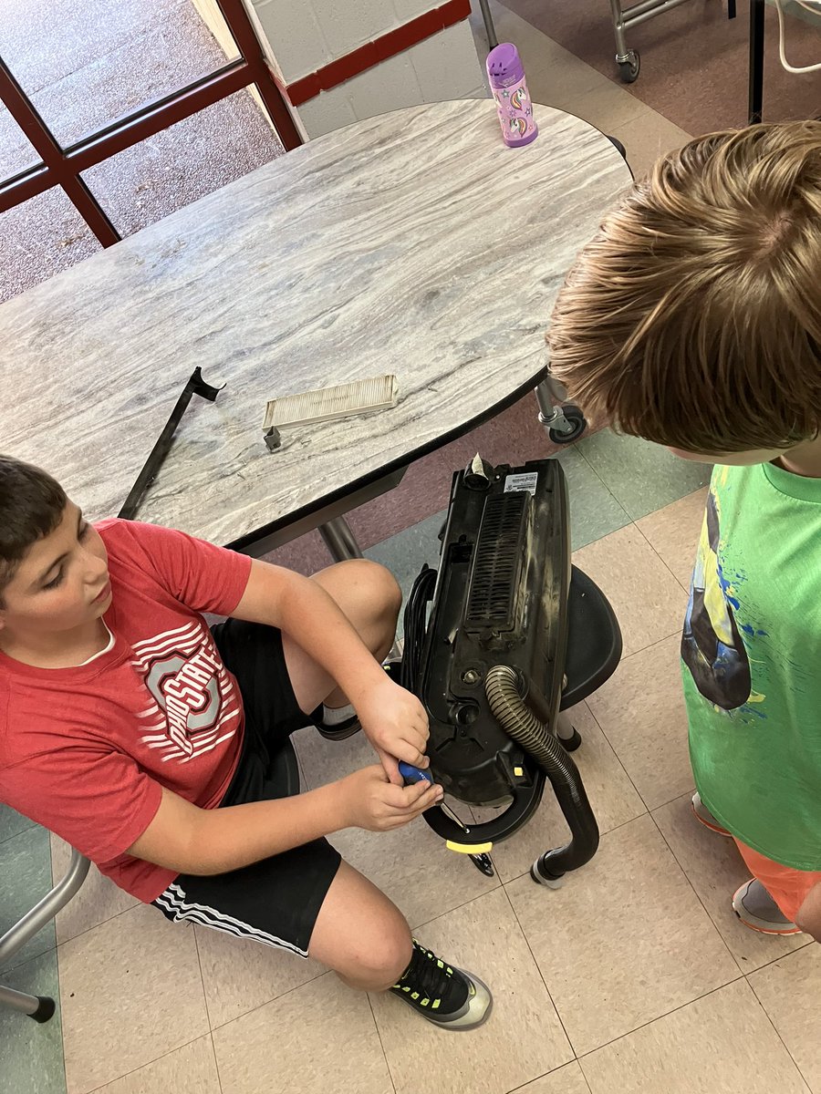 ESPatMCS's tweet photo. 5th & 6th graders began deconstructing vacuums today #afterschool. Students will use parts to rebuild a vacuum. They loved getting to the heart (engine) and seeing how everything is powered. #stem #engineering #tinyengineers #esp #as https://t.co/Z1xrHorJeq