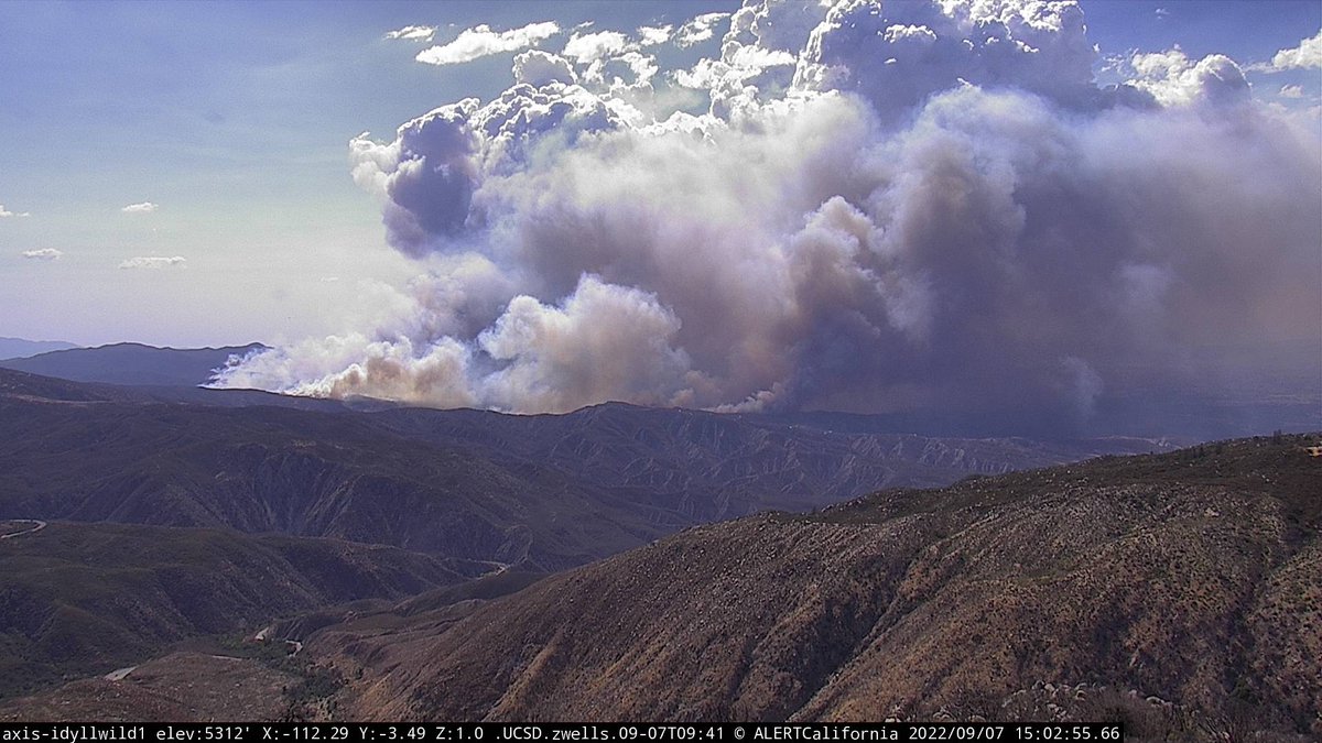 CaFireSource's tweet photo. Fairview Incident - Valle Vista CA Riverside County ~ “Fire well established on both sides of Bautista canyon” #FairviewFire, image of the cumulus by @AlertWildfire  Idyllwild1 camera. https://t.co/AyApbWHBCU