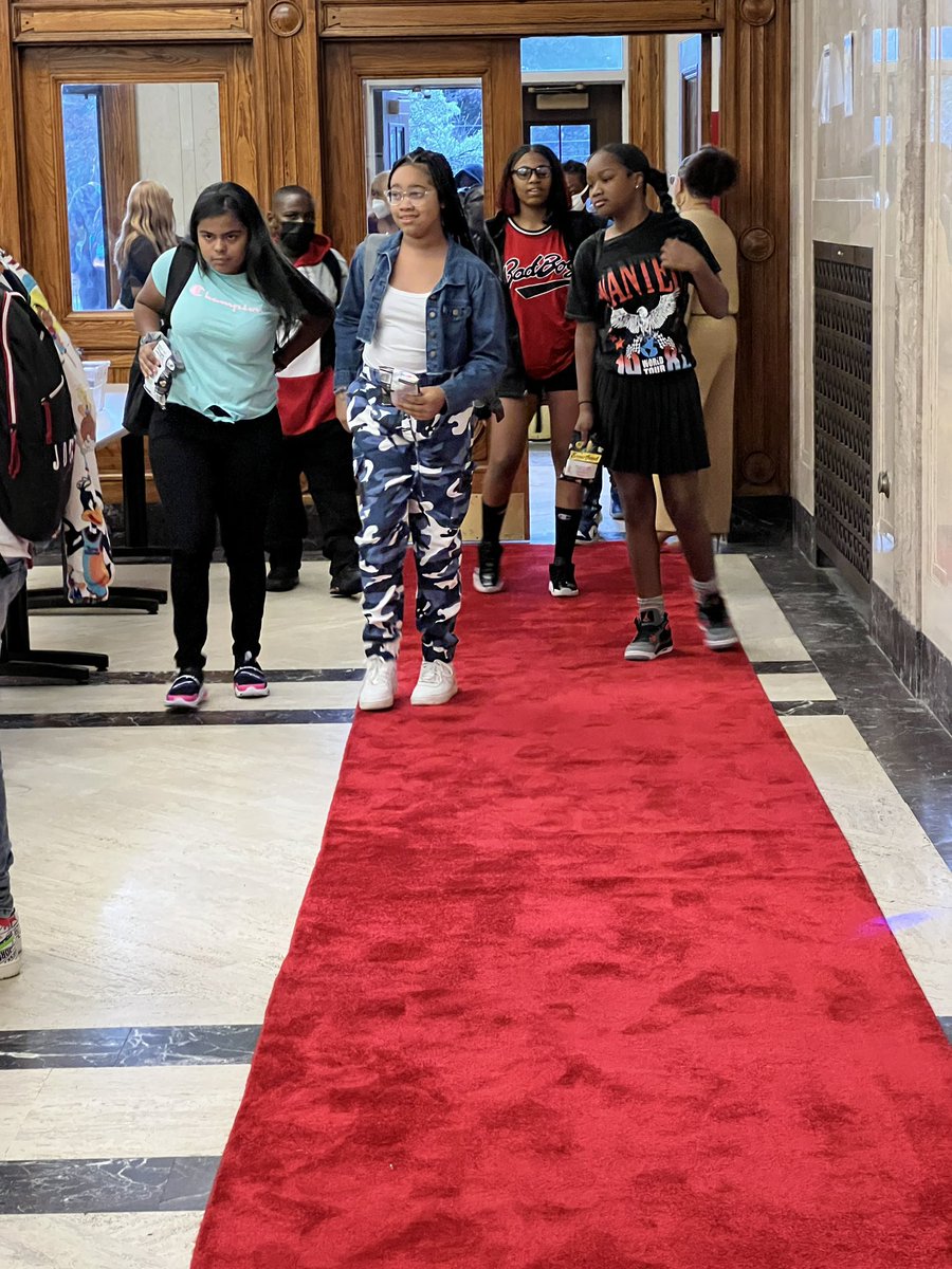 RCSDFranklin's tweet photo. At Franklin Lower we literally rolled out the red carpet to greet our scholars for the new year. A huge shout out to Ms. Lewis for setting the vibe and and bringing such joy to the first day of our 3rd year as a school. @RCSDNYS @drpeluso https://t.co/ViyqjBmznX