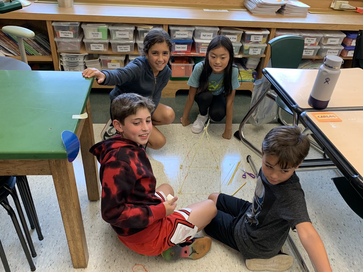 QRGega's tweet photo. It’s all about teamwork! Building the tallest, freestanding structure with spaghetti, marshmallows, tape, and string. #QRSpride https://t.co/tgdcoTA198