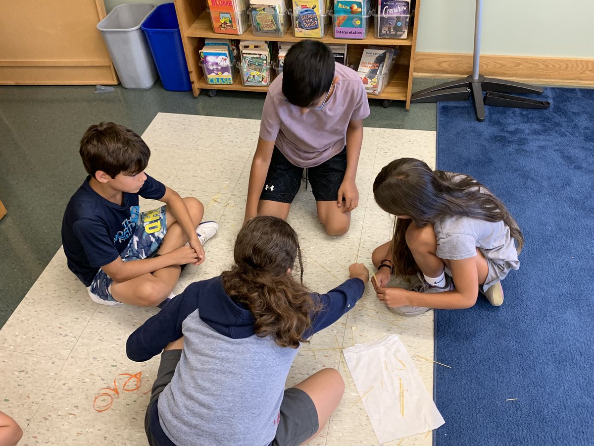 QRGega's tweet photo. It’s all about teamwork! Building the tallest, freestanding structure with spaghetti, marshmallows, tape, and string. #QRSpride https://t.co/nnNVdU8bQH