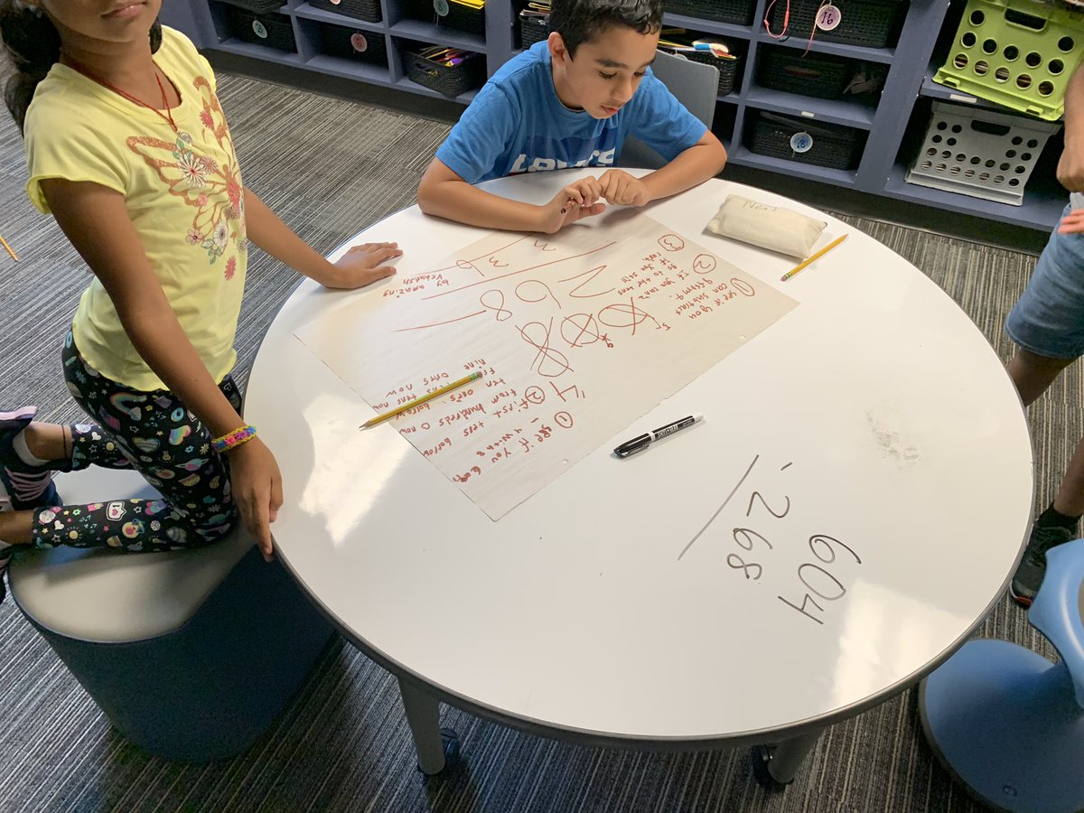 EmilyLosos's tweet photo. Students writing down how to solve 604-268! The biggest focus was listing the steps for how to borrow when there’s a zero! @RiddleElem #math #mathtask #FISDmadetoshine https://t.co/LSCiCAn7Hz