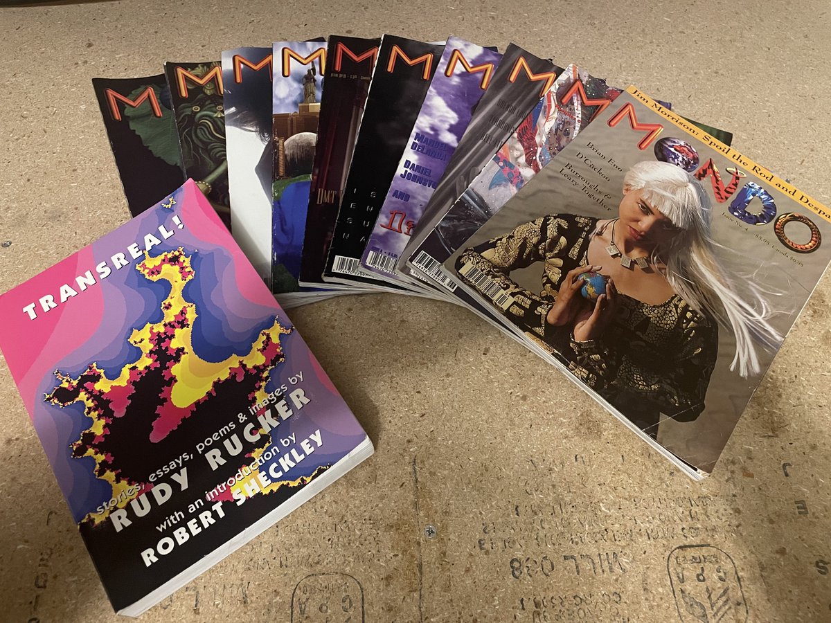 today i got an entire STACK of <a href="/2000_mondo/">MONDO 2000</a> and a copy of <a href="/rudytheelder/">Rudy Rucker</a>'s transreal! from <a href="/xinjeisan/">たまご</a> :)

these will live at <a href="/QueeriousLabs/">Queerious Labs</a> for anyone to read and enjoy :D