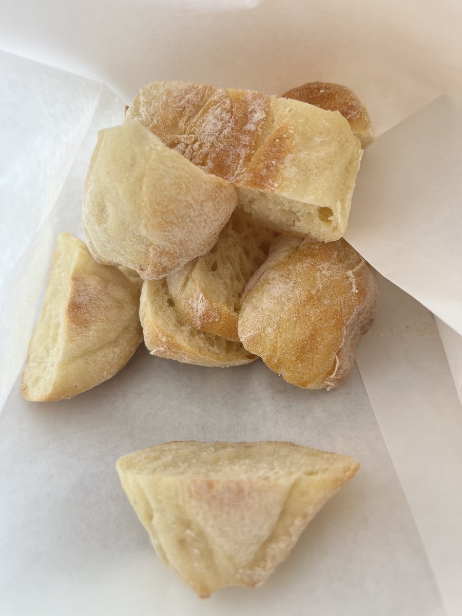 Elizabe74578992's tweet photo. I went to Italy this summer and took this picture of freshly baked bread...how many pieces of bread do you see? How do you know?
#QuickImage
#EDC370 https://t.co/G2IBfBbeYH
